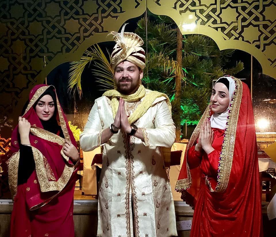 The Jashan Famagusta team welcoming guests in traditional Indian dress